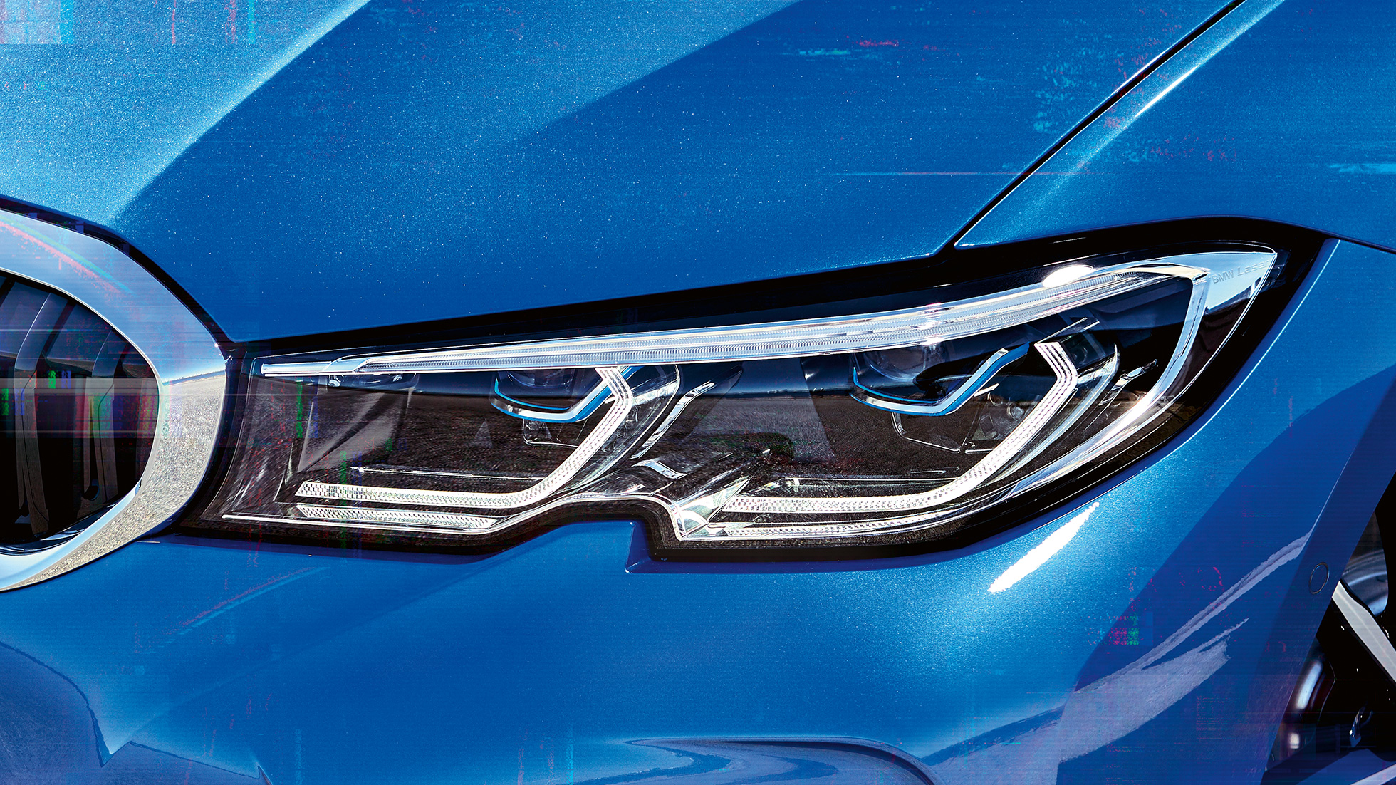 BMW 3 Serisi Sedan, BMW Laserlight. BMW Laserlight özellikli sağ ön farların yandan yakın çekimi.